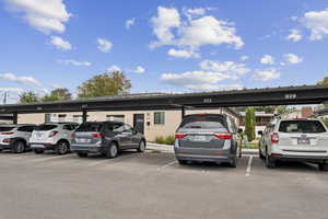 Parking lot with assigned, covered parking.