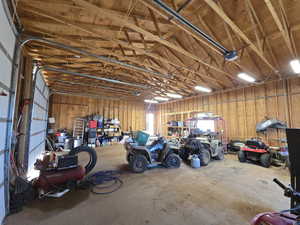 Garage featuring a garage door opener