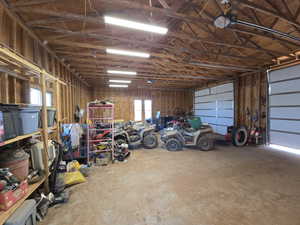 Garage featuring a garage door opener