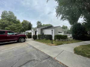 Single story home with an attached garage
