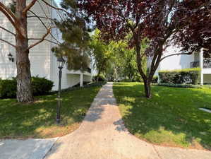 View of home's community featuring a lawn
