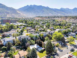 Aerial view of residential area featuring a mountain backdrop