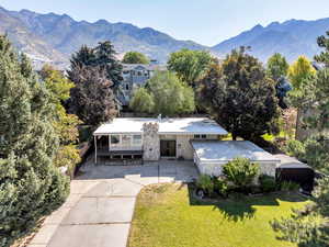 View from above of property featuring a mountainous background