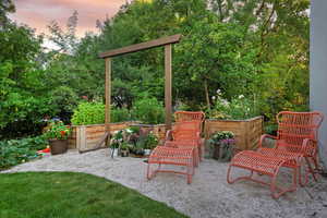 Patio terrace at dusk featuring a patio area