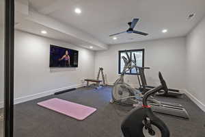 Exercise room with recessed lighting and ceiling fan