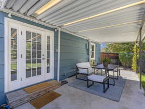 View of patio featuring french doors