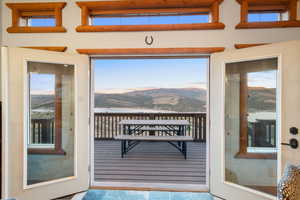 Entryway featuring a mountain view and healthy amount of natural light