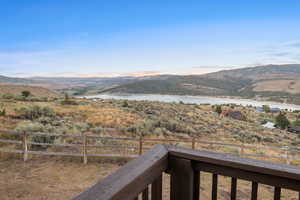 View of mountain backdrop with a large body of water