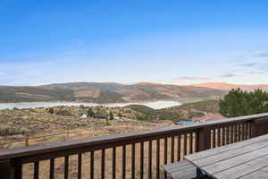 View of mountain backdrop with a nearby body of water