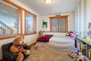 Bedroom with baseboards