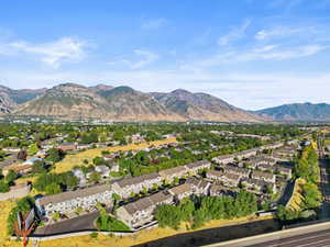 Mountain view featuring nearby suburban area