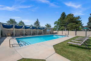 Community pool featuring a patio area