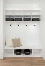 Mudroom with light wood-type flooring