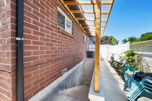 View of separate, covered entrance into basement
