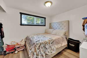 Bedroom featuring light wood-style flooring