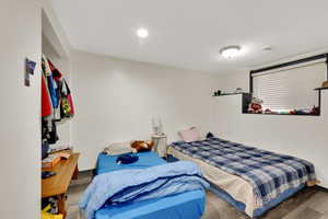 Bedroom featuring wood finished floors