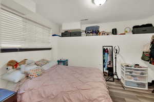 Bedroom featuring light wood-type flooring