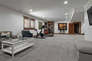 Workout room featuring recessed lighting and carpet floors