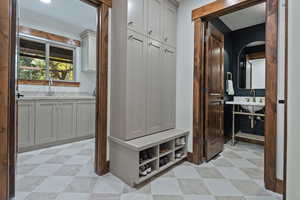 Mudroom with light floors