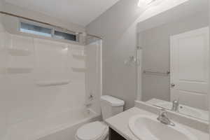 Full bathroom featuring vanity and bathing tub / shower combination