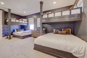 Bedroom featuring light colored carpet and recessed lighting