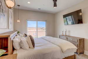 Bedroom featuring a ceiling fan and recessed lighting