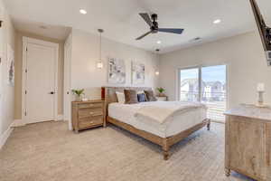 Bedroom with recessed lighting, light carpet, and ceiling fan