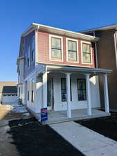 (Actual Home) View of front of home featuring a porch