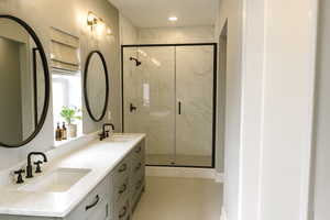 Owner's ensuite bathroom. Picture is example of same floorplan, but not actual home.