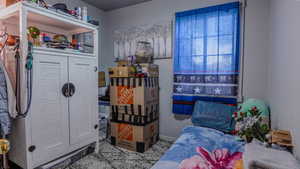 Bedroom with baseboards