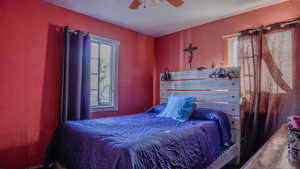 Bedroom featuring ceiling fan