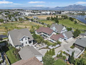 Aerial view of residential area featuring a water and mountain view