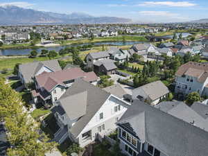 Aerial view of residential area featuring a water and mountain view
