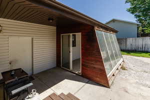View of patio featuring area for grilling
