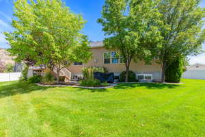 Back of property with stucco siding