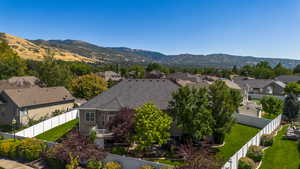 Aerial view of residential area with a mountain backdrop