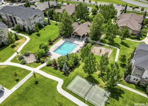 Aerial perspective of suburban area with a pool