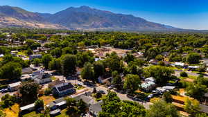 Aerial view of residential area with a mountain backdrop
