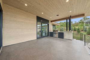 View of patio with an outdoor kitchen