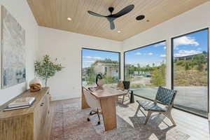 Home office featuring light wood-style floors, a ceiling fan, recessed lighting, and wood ceiling