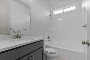 Full bathroom featuring  shower combination and vanity