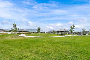 Surrounding community featuring a gazebo, a yard, a patio area, and a residential view