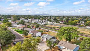 Aerial view of residential area featuring a mountain backdrop