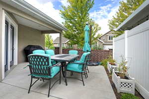 View of patio featuring outdoor dining area