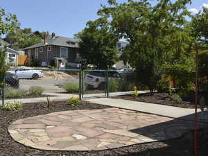 View of patio / terrace featuring a fenced front yard and a gate