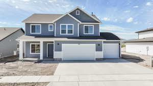 View of front facade with covered porch, board and batten siding, driveway, an attached garage, and roof with shingles