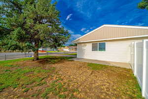 Side yard! Large corner lot. Fully fenced. New vinyl fence around the back yard.
