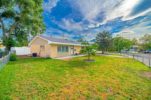 Cute Brick Rambler in Sandy. On a corner lot. Mtn Views. Fully fenced!