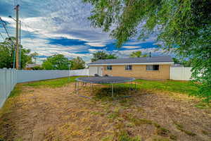 Backyard for your entertainment. Fully fenced. New vinyl fence around the back yard.