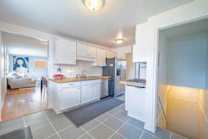 Kitchen. Stainless Steel Appliances! Gas Range. Wall Oven. Beautiful Tile!